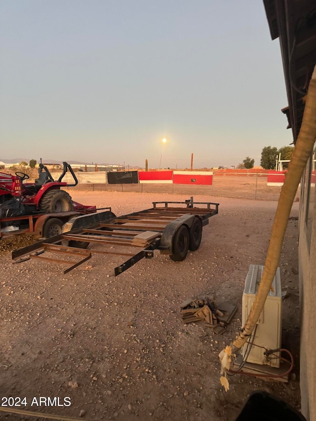 view of yard at dusk