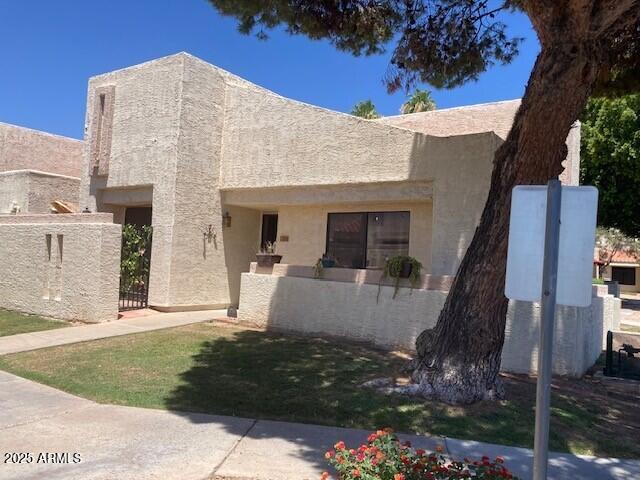 774 E Morningside Dr, Phoenix, AZ 85022 - pueblo revival-style home featuring stucco siding