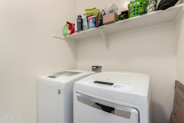 washroom featuring independent washer and dryer