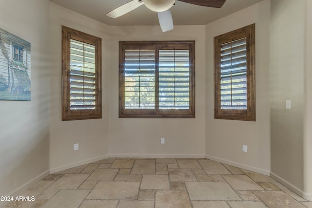 spare room featuring ceiling fan