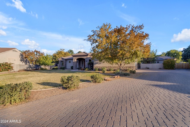 view of front of home with a front yard