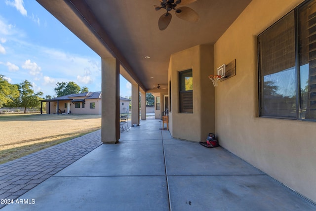 view of patio with ceiling fan