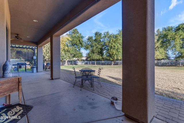 view of patio / terrace featuring ceiling fan