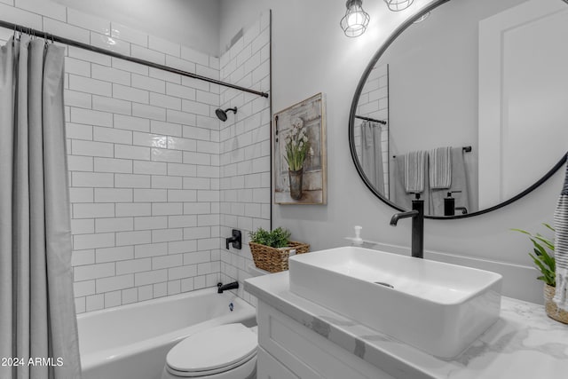 full bathroom with vanity, toilet, and shower / bath combo with shower curtain