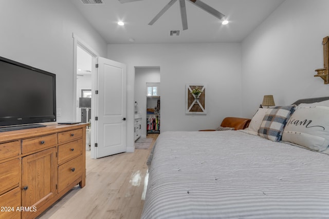 bedroom featuring light hardwood / wood-style flooring and ceiling fan