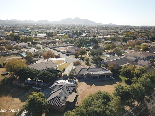 birds eye view of property featuring a mountain view