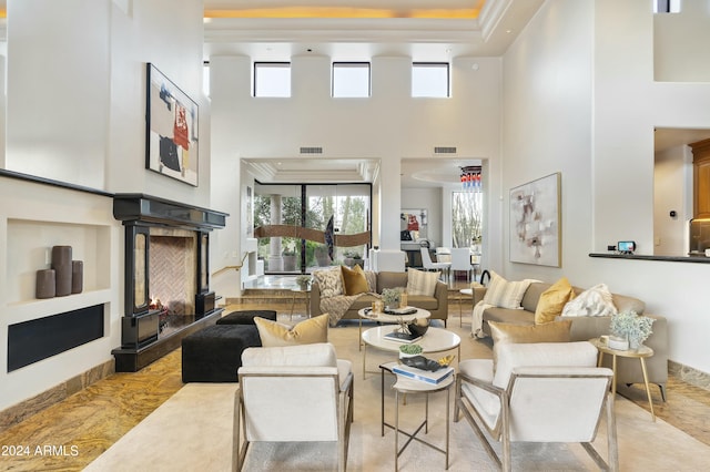 living room with a towering ceiling