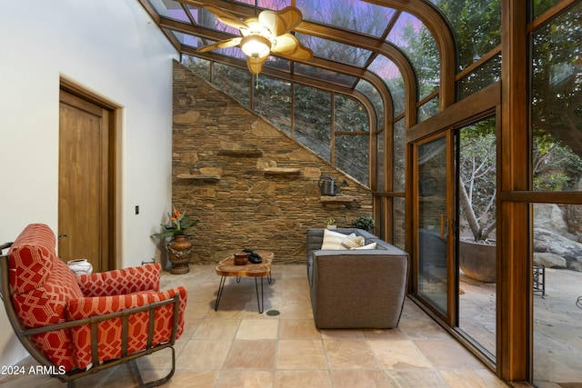 sunroom / solarium with ceiling fan