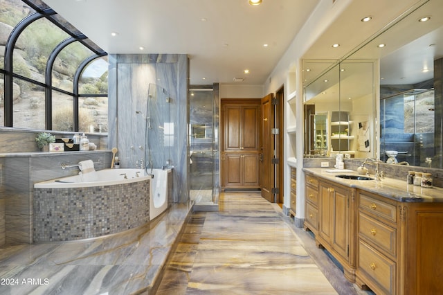 bathroom with plus walk in shower and vanity