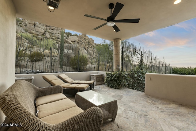 patio terrace at dusk with ceiling fan