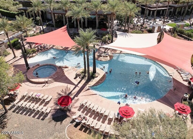 view of pool with a community hot tub