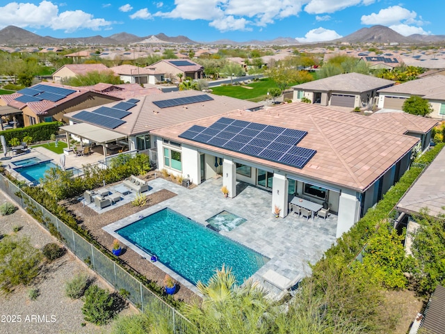 drone / aerial view with a residential view and a mountain view