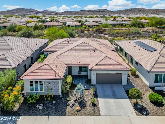 aerial view with a residential view and a mountain view