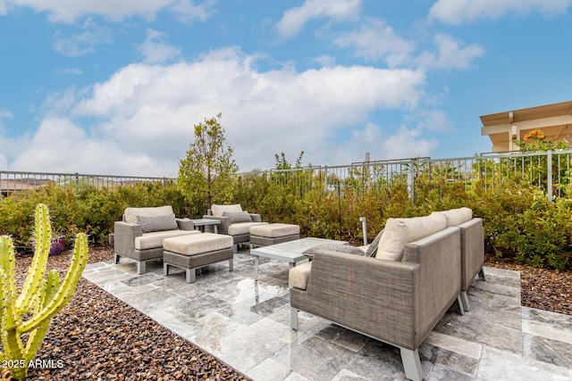 view of patio / terrace with an outdoor hangout area and a fenced backyard