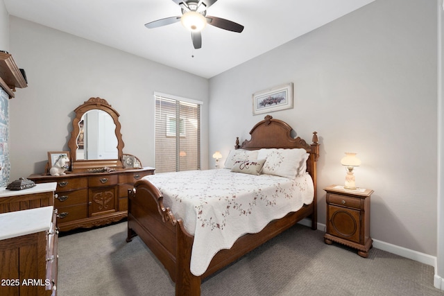 bedroom with baseboards, a ceiling fan, and light colored carpet