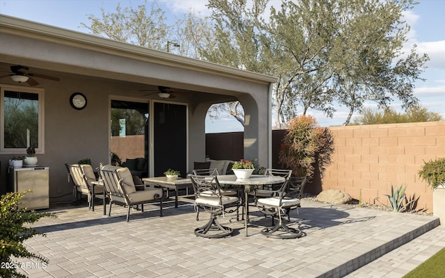 view of patio / terrace featuring ceiling fan