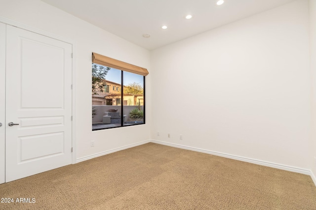 view of carpeted spare room