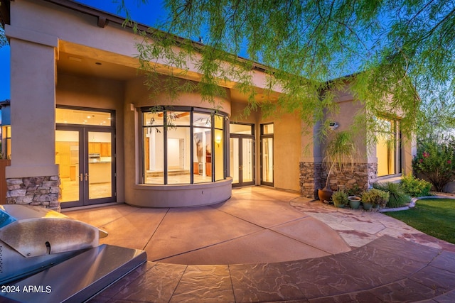 back of house with a patio area