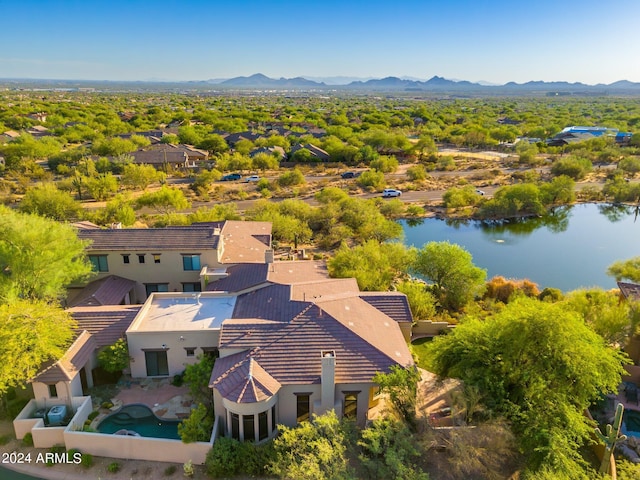 birds eye view of property featuring a mountain view