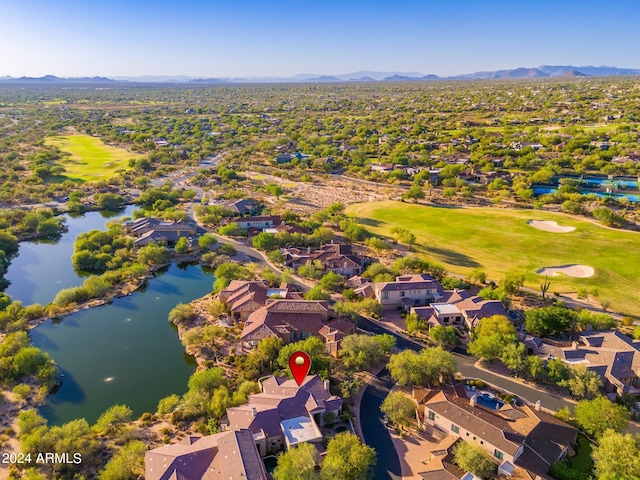 aerial view featuring a water and mountain view