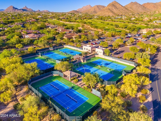 birds eye view of property with a mountain view