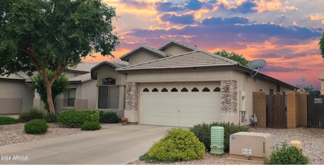 view of front of property featuring a garage