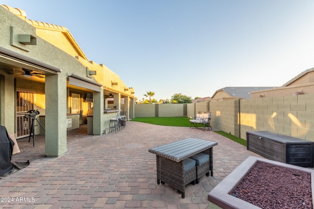 view of patio with ceiling fan