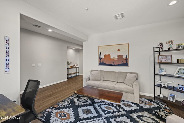 living room featuring dark hardwood / wood-style flooring