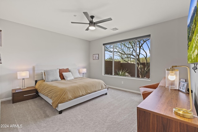 bedroom featuring ceiling fan and carpet flooring