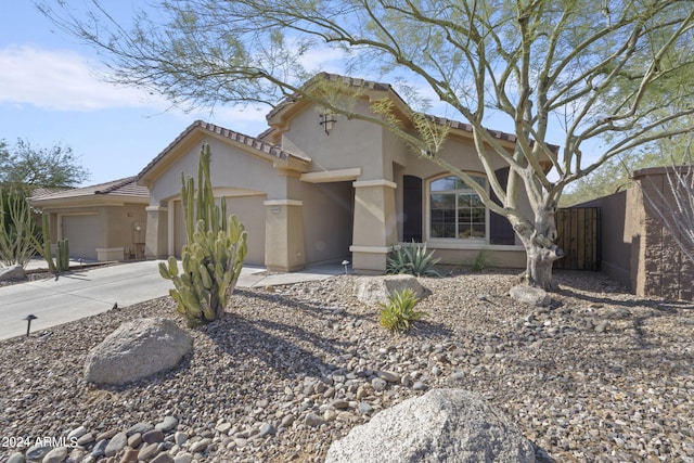 view of front of home with a garage