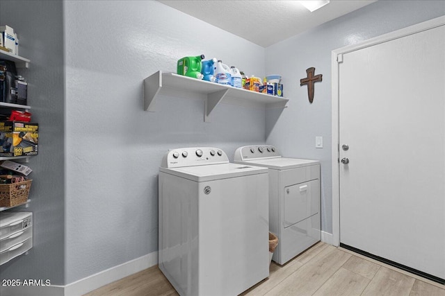 5026 S 235th Dr, Buckeye, AZ 85326 - laundry room featuring washer and dryer and light wood-style floors
