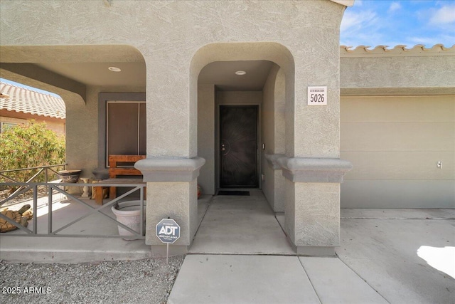 5026 S 235th Dr, Buckeye, AZ 85326 - doorway to property featuring stucco siding