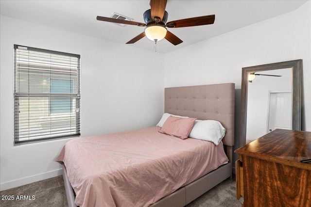 5026 S 235th Dr, Buckeye, AZ 85326 - carpeted bedroom with baseboards and ceiling fan