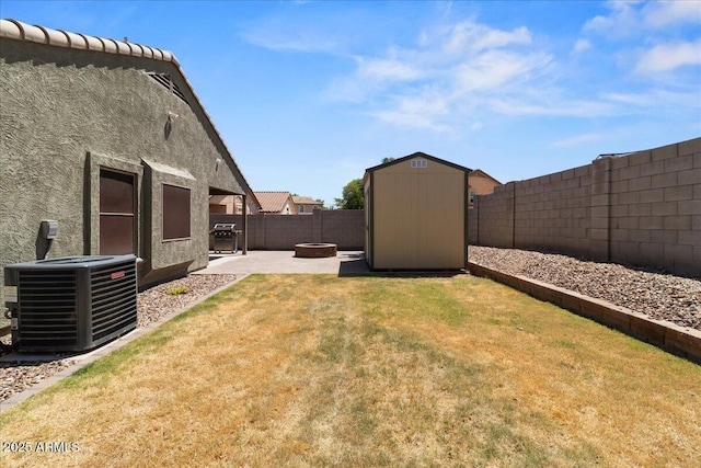 5026 S 235th Dr, Buckeye, AZ 85326 - fenced backyard featuring a storage shed and a patio area