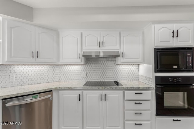 kitchen with black appliances, under cabinet range hood, light stone countertops, and white cabinets