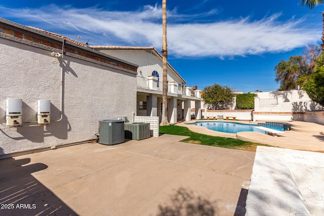 view of swimming pool with a fenced in pool, cooling unit, a patio area, and fence