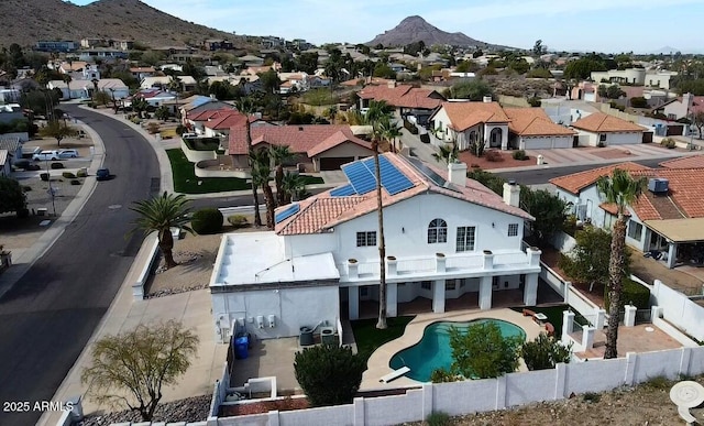 birds eye view of property featuring a residential view and a mountain view