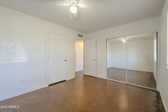 7737 W Medlock Dr, Glendale, AZ 85303 - unfurnished bedroom featuring visible vents, baseboards, concrete flooring, and ceiling fan