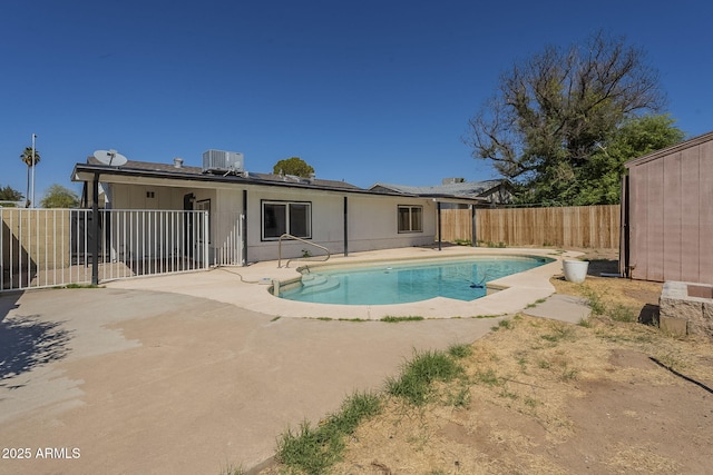 7737 W Medlock Dr, Glendale, AZ 85303 - view of pool with a patio, central air condition unit, a fenced backyard, and a fenced in pool