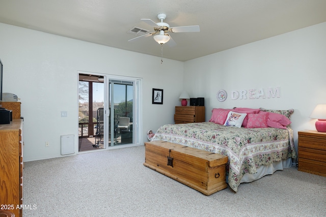 bedroom with a ceiling fan, access to outside, visible vents, and carpet flooring