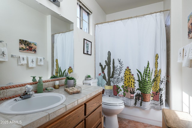 bathroom with tile patterned flooring, shower / bathtub combination with curtain, vanity, and toilet