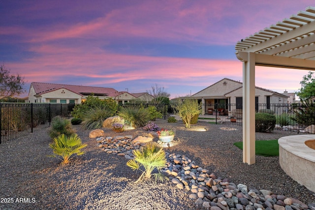 view of yard featuring a pergola and a fenced backyard