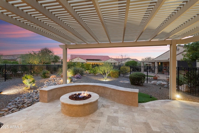 view of patio / terrace featuring a fire pit and a fenced backyard