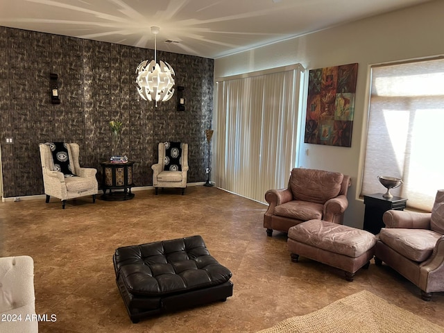 living room with a notable chandelier