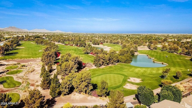 birds eye view of property featuring a water and mountain view