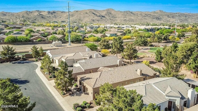 birds eye view of property featuring a mountain view