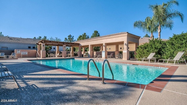 view of pool featuring a patio area