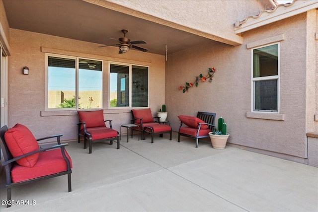 view of patio with ceiling fan