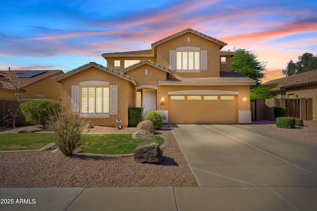 4976 E Thunderbird Dr, Chandler, AZ 85249 - view of front of home with stucco siding, driveway, a garage, and a tiled roof