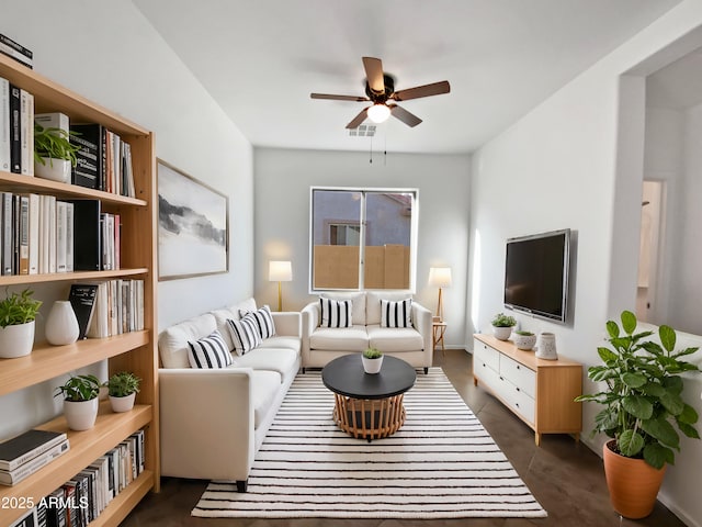 living room featuring ceiling fan